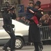 Michael with a little girl on his arm. Paris 1997. Vespera photo