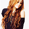 Miley Cyrus is one of my favorite celebrities!  This is a cute picture of her. Cupcake138 photo