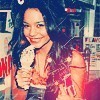 vanessa hudgens she is eating ice cream in a ice cream store tamilnna photo