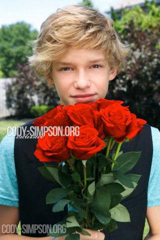 Cody Simpson with roses