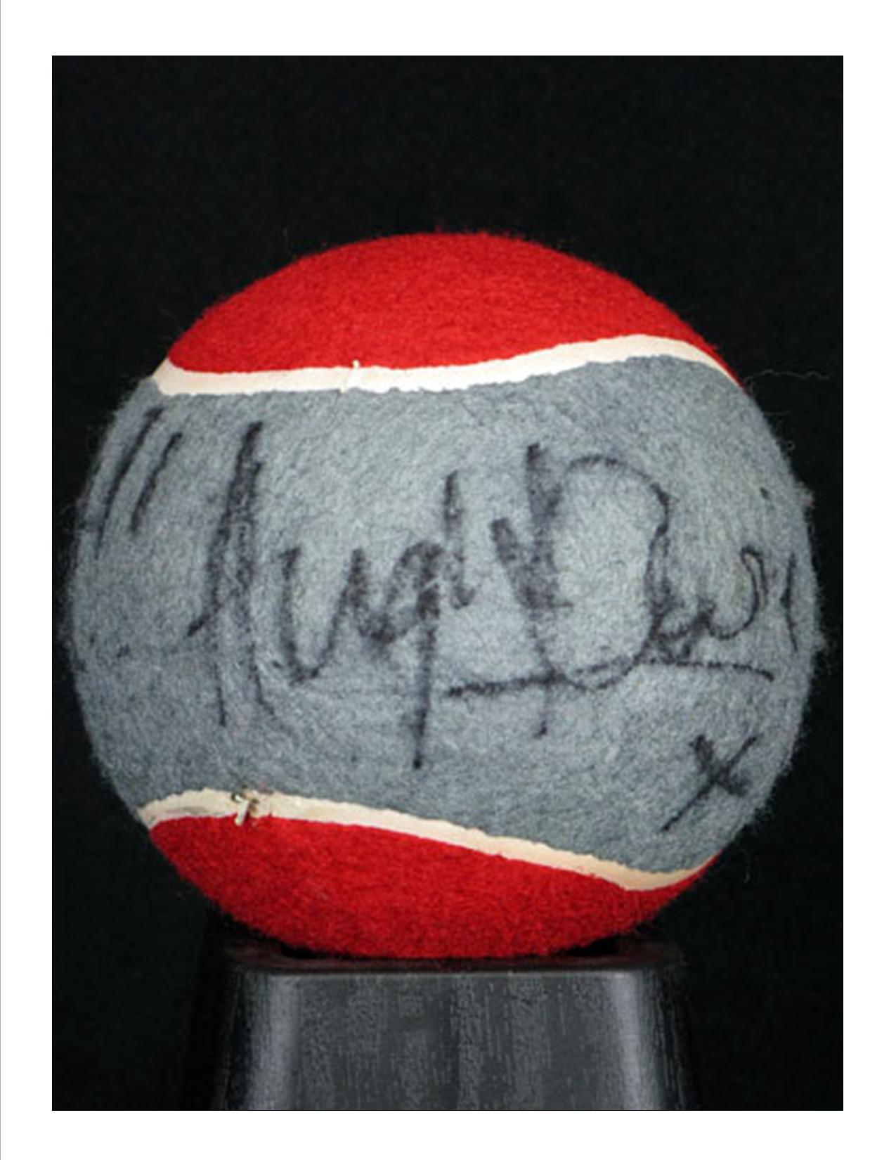 Hugh autographs House tennis ball
