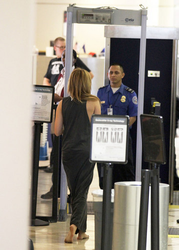  miley cyrus at an airport in LAX