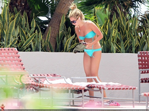  Ashley - Relaxing poolside in Miami - September 03, 2011