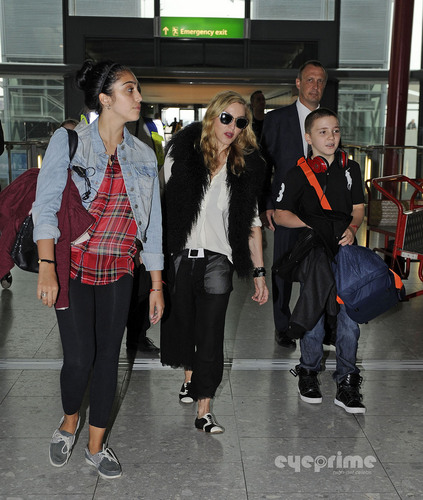  Madonna and Family arrive at Heathrow Airport in London, Sept 4