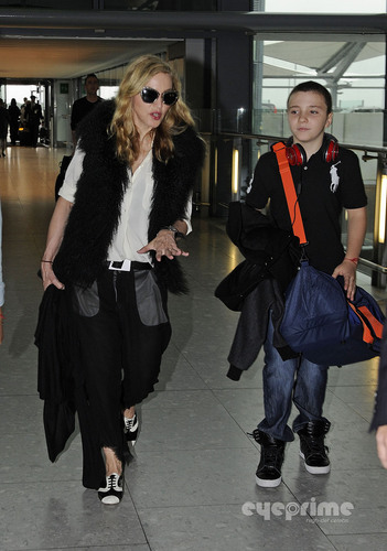  Madonna and Family arrive at Heathrow Airport in London, Sep 4