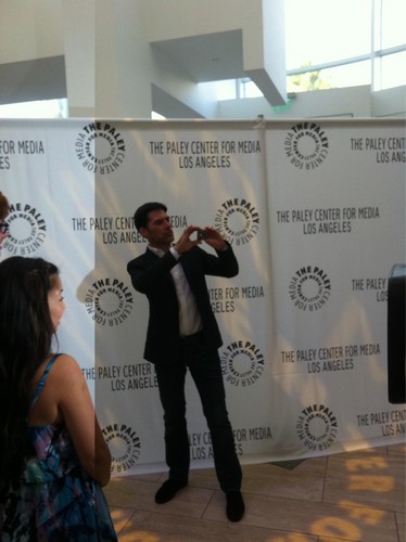  Thomas Gibson snaps a shot of the photogs