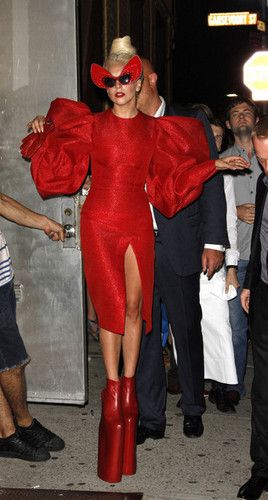  Gaga shows off a little 더 많이 than she'd hoped in a red crotch revealing outfit.