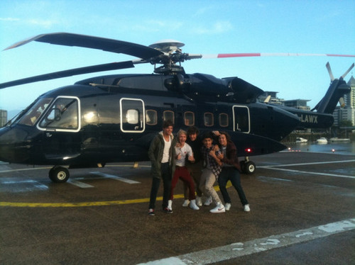  One Direction in a Helicopter on their way to signings [11/09/11] <3