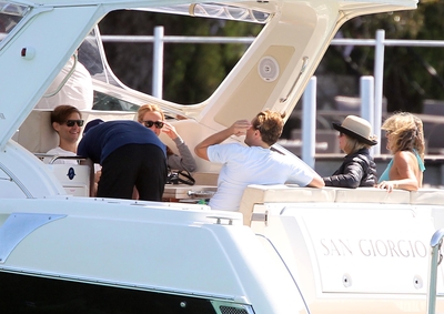 Leo and Tobey maguire on a boat