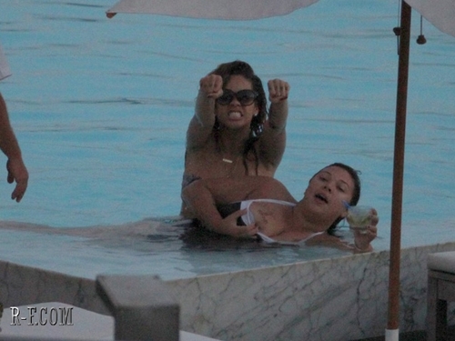  Рианна - At her hotel's pool in Rio de Janeiro - September 20, 2011