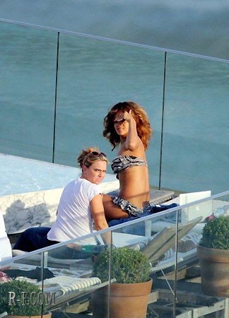  Rihanna - At her hotel's pool in Rio de Janeiro - September 20, 2011