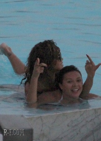  Рианна - At her hotel's pool in Rio de Janeiro - September 20, 2011