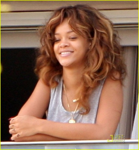  Rihanna rocks out on the balcony of her hotel on Tuesday (September 20) in Rio de Janeiro, Brazil.