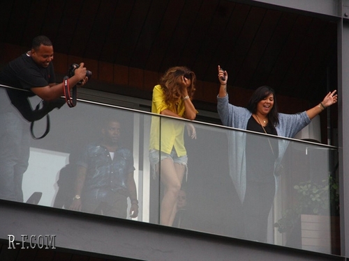  Rihanna - On the balcony of her hotel room in Rio de Janeiro - September 22, 2011