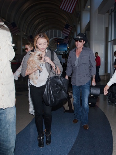 Miley - At LAX Airport with Liam, Tish & Billy Ray - September 27, 2011