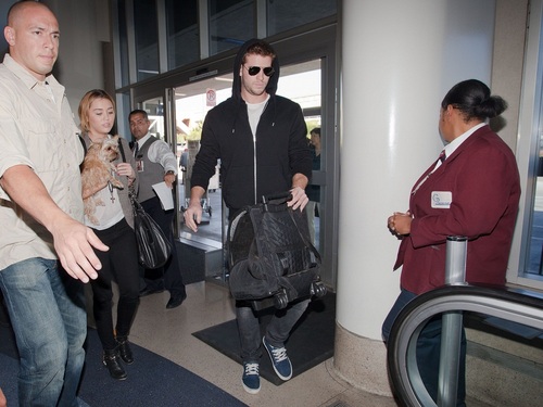  Miley - At LAX Airport with Liam, Tish & Billy rayon, ray - September 27, 2011