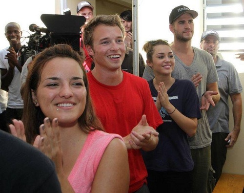  Miley Cyrus ~ 05. October- Opening of a Haitian School