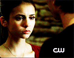  Elena starring at Damon's lips