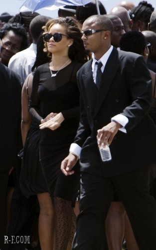  蕾哈娜 - At a funeral in Barbados - October 08, 2011