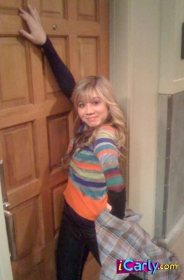  Sam in front of Carly's door