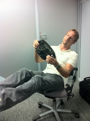 JB playing with his f1 car steering... 0_o yeah,he's a driver...