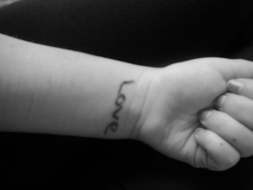  To Write amor On Her Arms