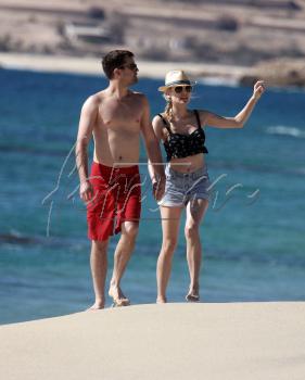  Diane and Joshua enjoy a romantic walk on the strand in Mexico - November 26th