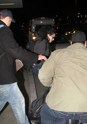  Kristen Stewart leaving LAX airport in Los Angeles - December 13, 2011.