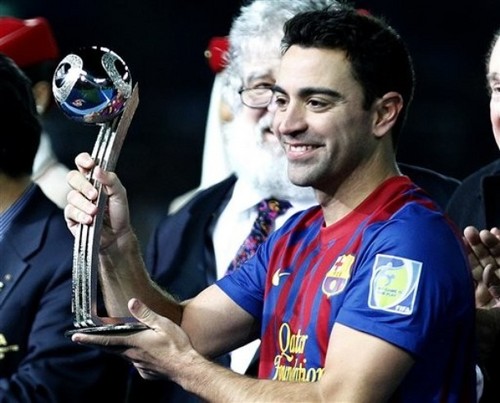  Santos FC (0) v FC Barcelona (4) - FIFA Club World Cup Final: Xavi recieves the Silver Ball