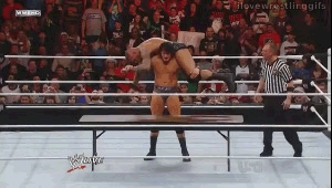  Wade Barrett Wastelands Randy Orton through the tafel, tabel