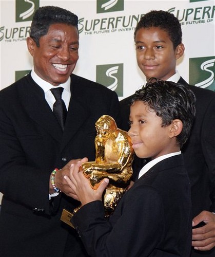  jermaine and his kids jaafar and jermajesty attend the Save The World Awards in Austria