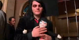  gerard holding a gerard doll lol :)