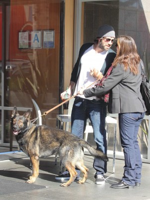 Ben and Jen PDA while take their dog for a walk