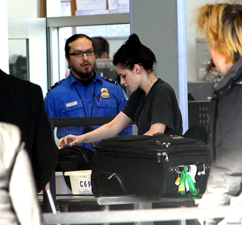  Kristen Stewart at LAX airport in Los Angeles, California - January 29, 2012.