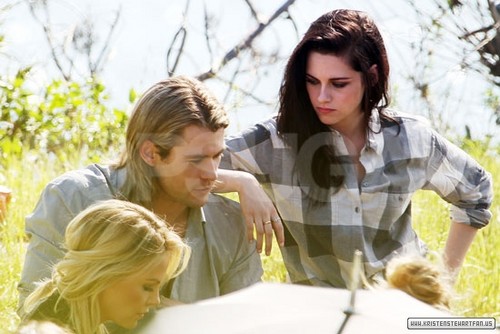  Kristen Stewart on a photoshoot with Charlize Theron & Chris Hemsworth - January 27, 2012.