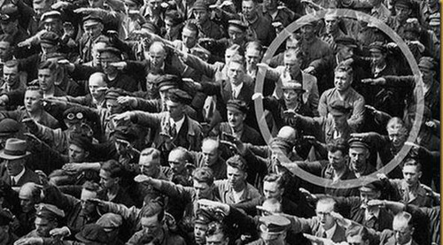 August Landmesser, shipyard worker in Hamburg, refused to perform Nazi salute