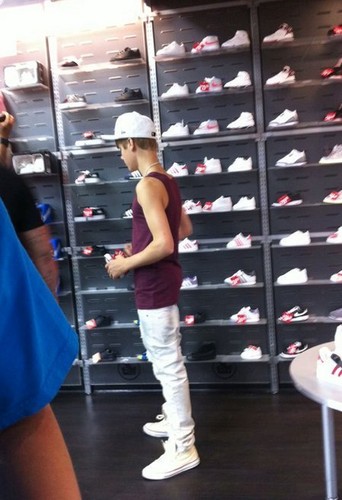  Justin buying shoes at a store