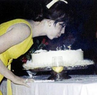 Natalie blows the candles on her birthday cake :)