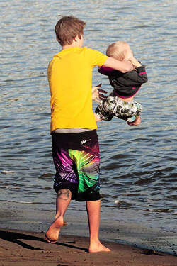 Justin having fun with family at a beach