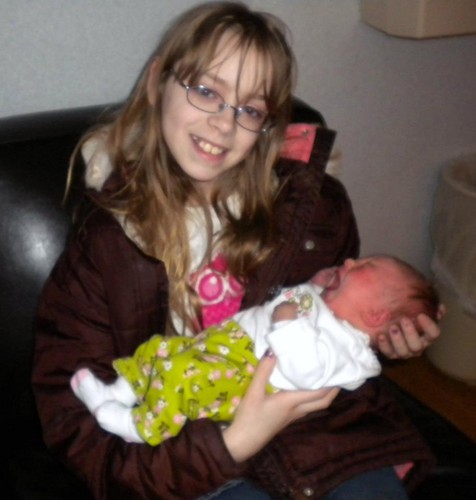  Me holding my newborn cousin,Kambry LeAnn Sage
