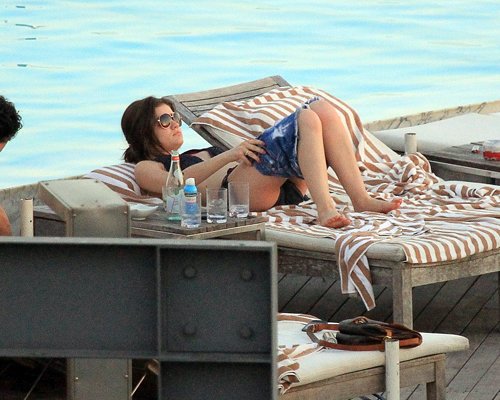 Lucy Hale and Shay Mitchell at their hotel swimming pool in Rio (February 29).