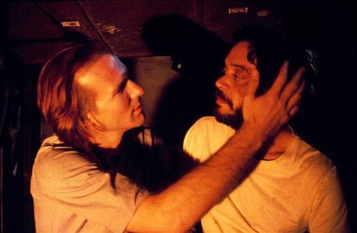 William Hurt as Molina and Raul Julia as Valentin in Kiss of the Spider Woman
