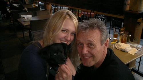 Tony and Emily with a puppy