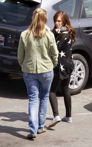  Emma Watson and Kirsten Dunst on the Los Angeles set of their new film, "The Bling Ring" (March 27).