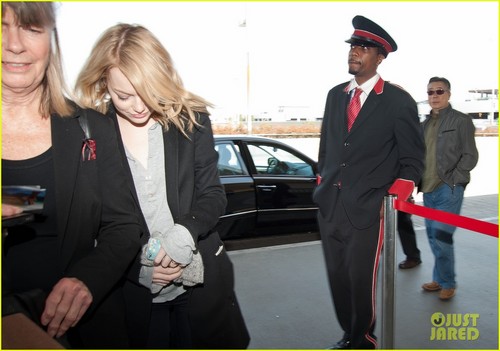  Emma Stone Heads Out With Her Head Down