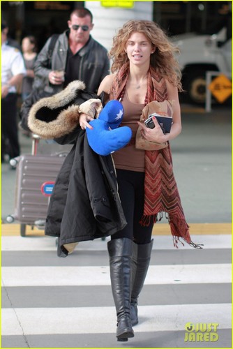  AnnaLynne McCord and arrives on a flight from Los Angeles