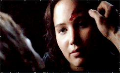  Peeta and Katniss in the cave