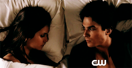  Elena opening her eyes when Damon lays down