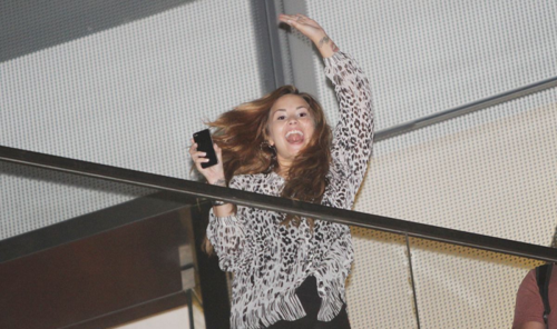  Demi - Greets 팬 from the Westin De San Isidro hotel balcony in Lima, Peru - April 16th 2012