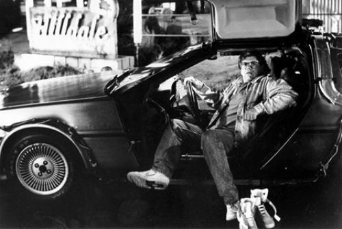 Robert Zemeckis sits in the Delorean